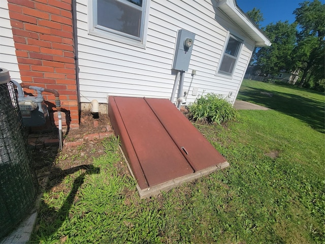 108 W Logan St, Casey, IA 50048 - exterior view of a bulkhead entry and electric meter