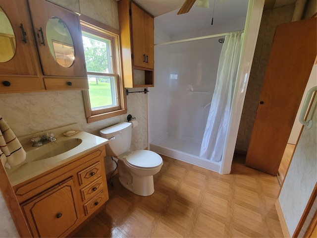 108 W Logan St, Casey, IA 50048 - full bathroom with vanity, a shower with shower curtain, and a ceiling fan