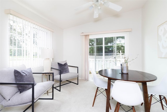7316 SE 23rd St Unit 5, Des Moines, IA 50320 - dining space with a ceiling fan, light colored carpet, and lofted ceiling