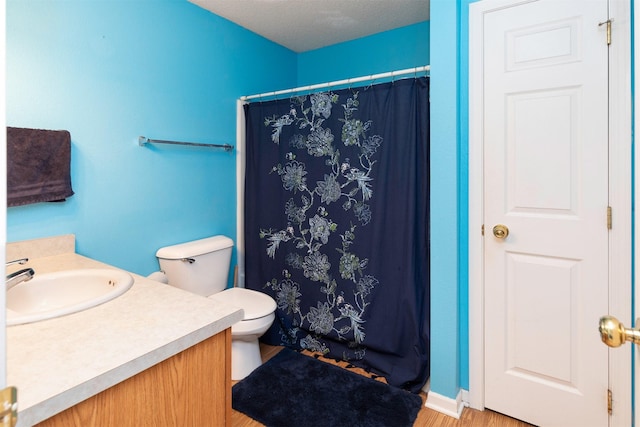 2609 Eagle Point Ct, Des Moines, IA 50320 - full bath with vanity, wood finished floors, and curtained shower