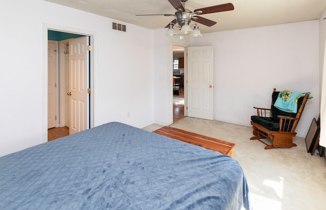 2609 Eagle Point Ct, Des Moines, IA 50320 - carpeted bedroom featuring a ceiling fan
