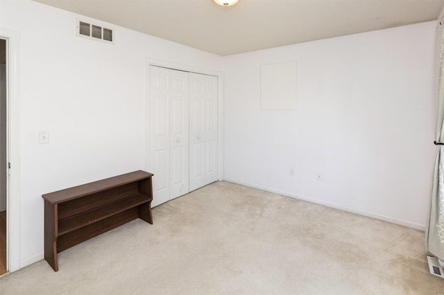 2609 Eagle Point Ct, Des Moines, IA 50320 - unfurnished bedroom with carpet and a closet