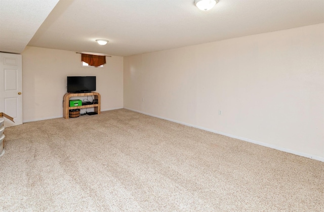 2609 Eagle Point Ct, Des Moines, IA 50320 - unfurnished living room featuring carpet floors and baseboards