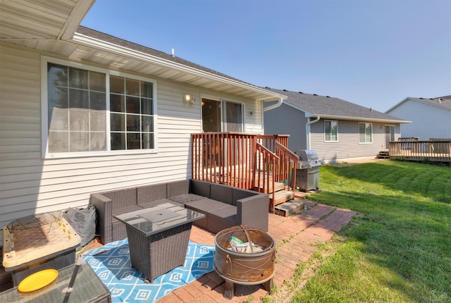 2609 Eagle Point Ct, Des Moines, IA 50320 - wooden deck featuring an outdoor living space with a fire pit, a grill, a yard, and a patio