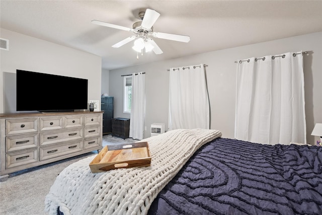 263 SE Booth Ave, Waukee, IA 50266 - bedroom featuring light colored carpet and ceiling fan