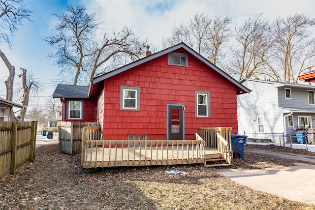 3021 49th St, Des Moines, IA 50310 - rear view of house with a deck