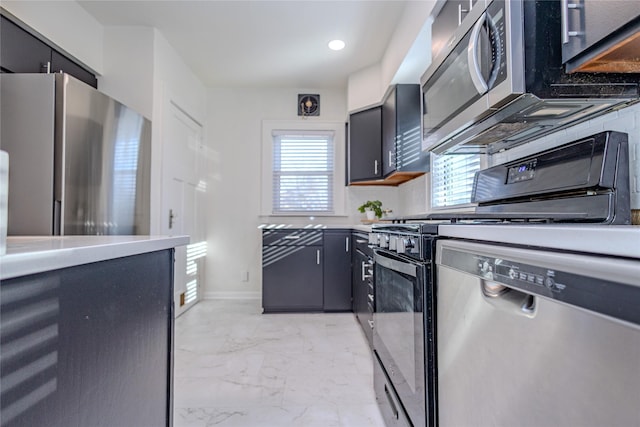 3021 49th St, Des Moines, IA 50310 - kitchen with appliances with stainless steel finishes, light countertops, light marble finish flooring, and recessed lighting