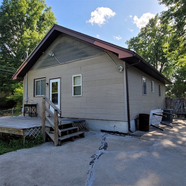 3901 3rd St, Des Moines, IA 50313 - rear view of house with a patio and a deck