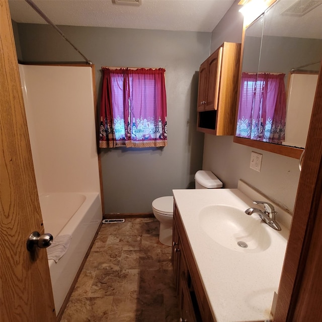 3901 3rd St, Des Moines, IA 50313 - bathroom with vanity, stone finish flooring, and tub / shower combination