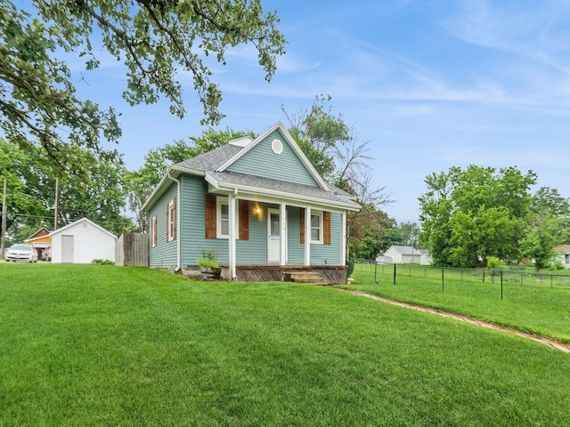 715 N Fremont St, Stuart, IA 50250 - view of front of home with covered porch and a shingled roof