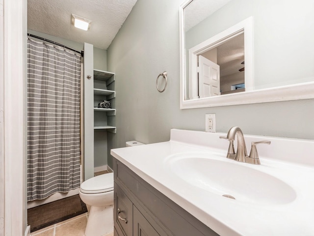 715 N Fremont St, Stuart, IA 50250 - full bathroom with vanity, tile patterned floors, a textured ceiling, and a shower with shower curtain