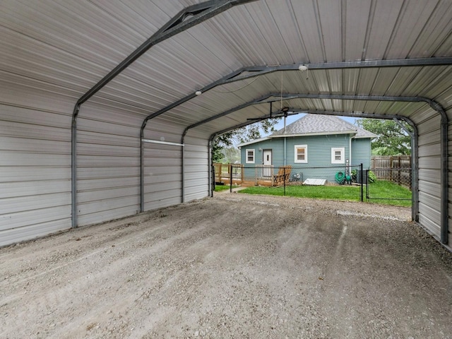 715 N Fremont St, Stuart, IA 50250 - garage featuring a carport