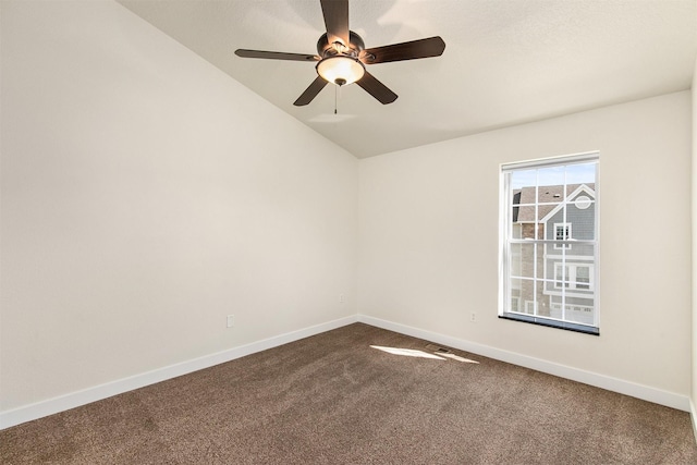 8302 Westown Pkwy Unit 1102, West Des Moines, IA 50266 - unfurnished room featuring dark carpet, lofted ceiling, and ceiling fan