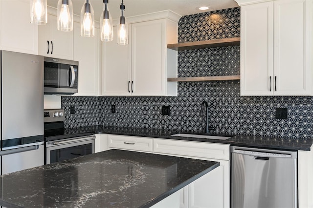 8302 Westown Pkwy Unit 1102, West Des Moines, IA 50266 - kitchen with appliances with stainless steel finishes, open shelves, white cabinets, decorative backsplash, and dark stone counters