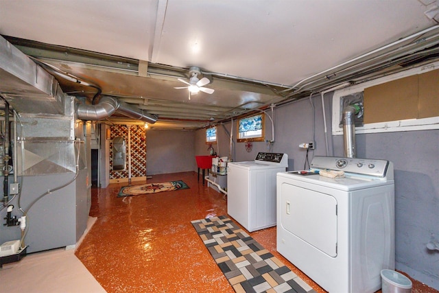 5910 Tonka Ave, Des Moines, IA 50312 - washroom featuring independent washer and dryer and heating unit