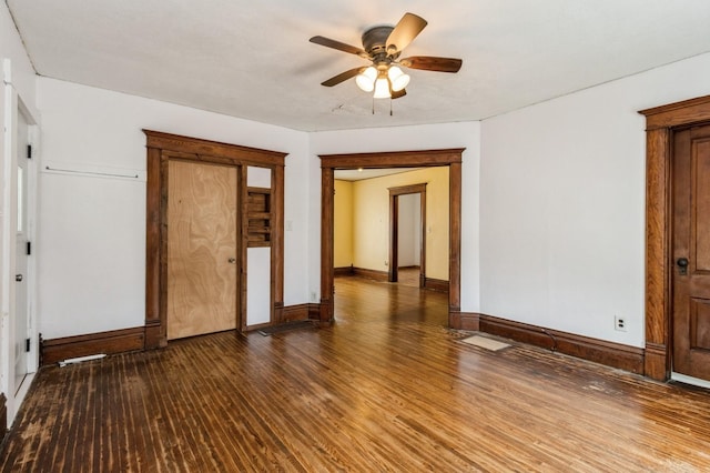 1805 S D Ave, Lovilia, IA 50150 - unfurnished room with wood finished floors and a ceiling fan
