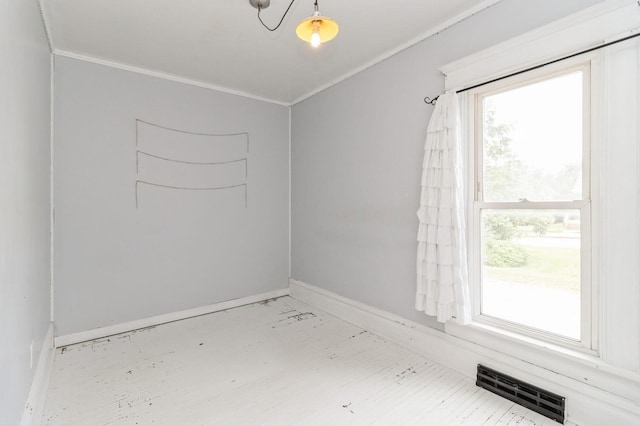 1805 S D Ave, Lovilia, IA 50150 - empty room with baseboards and ornamental molding