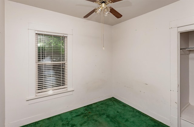 802 Fulton Dr, Des Moines, IA 50315 - unfurnished bedroom featuring carpet and ceiling fan