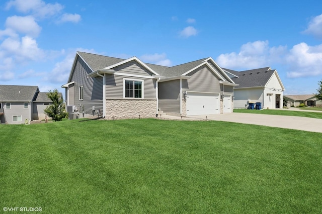2670 Long Ave, Van Meter, IA 50261 - view of front facade with stone siding, concrete driveway, a front yard, and a garage