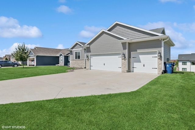 2670 Long Ave, Van Meter, IA 50261 - ranch-style house featuring driveway, a front lawn, an attached garage, and stone siding