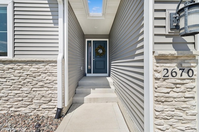2670 Long Ave, Van Meter, IA 50261 - property entrance featuring stone siding