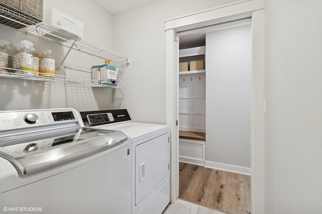 2670 Long Ave, Van Meter, IA 50261 - laundry area with washer and clothes dryer and light wood-type flooring
