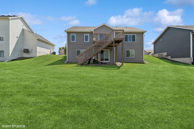 2670 Long Ave, Van Meter, IA 50261 - rear view of house featuring stairs, a deck, and a yard