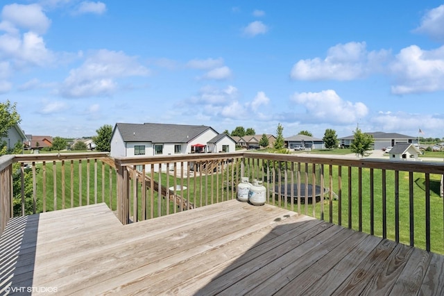2670 Long Ave, Van Meter, IA 50261 - wooden terrace with a residential view and a lawn