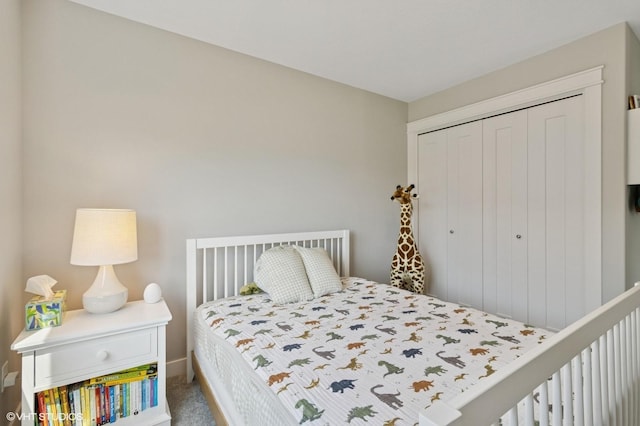 2670 Long Ave, Van Meter, IA 50261 - bedroom featuring a closet and carpet floors