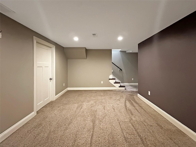 2814 Chicago Ave, Des Moines, IA 50317 - finished below grade area featuring carpet flooring, recessed lighting, and stairs