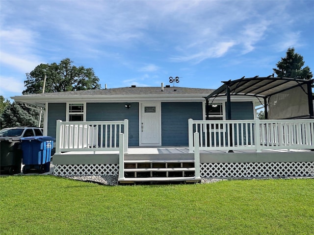 2814 Chicago Ave, Des Moines, IA 50317 - view of front of house featuring a deck, a front lawn, and a pergola