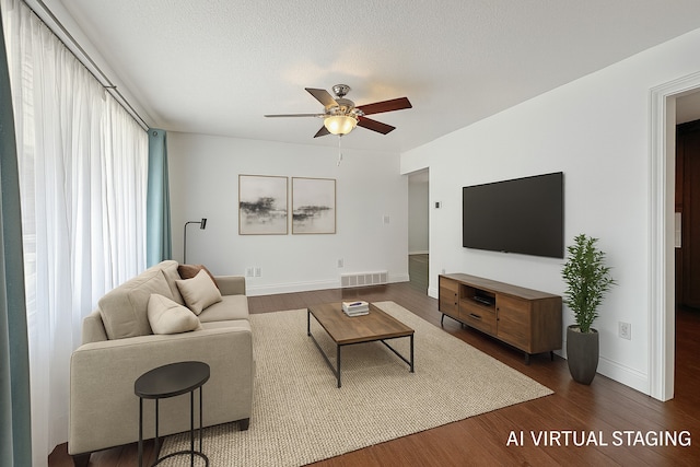 2814 Chicago Ave, Des Moines, IA 50317 - living area with a ceiling fan and dark wood-style floors