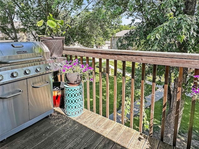9513 University Ave Unit 12, Clive, IA 50325 - deck with area for grilling and a yard