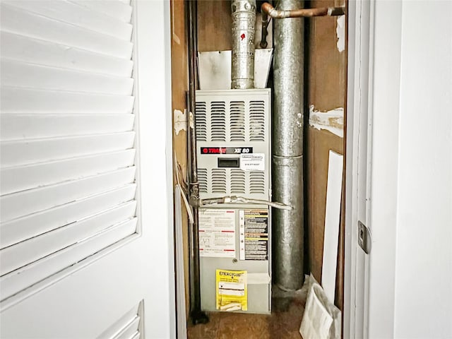 9513 University Ave Unit 12, Clive, IA 50325 - utility room with heating unit