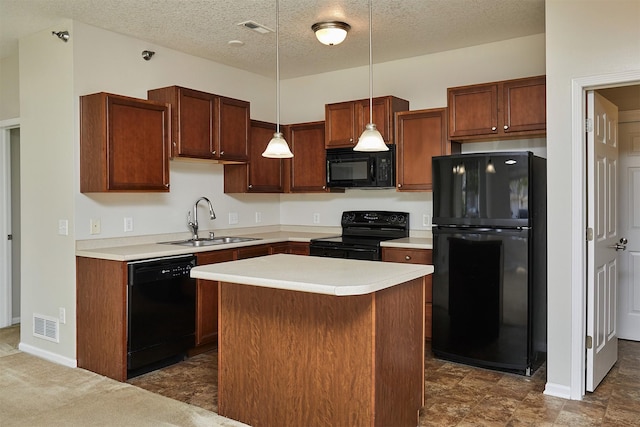 8601 Westown Pkwy Unit 5114, West Des Moines, IA 50266 - kitchen featuring black appliances, light countertops, decorative light fixtures, a textured ceiling, and a kitchen island