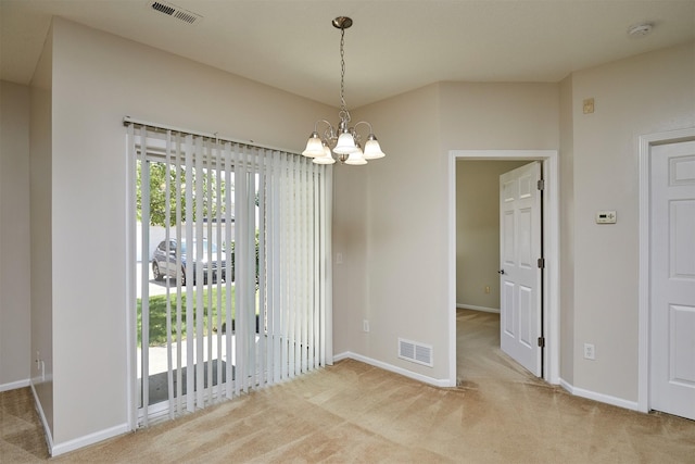 8601 Westown Pkwy Unit 5114, West Des Moines, IA 50266 - unfurnished dining area with carpet and a chandelier
