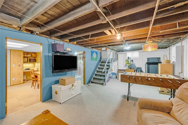 3602 64th St, Urbandale, IA 50322 - basement featuring stairway and carpet flooring