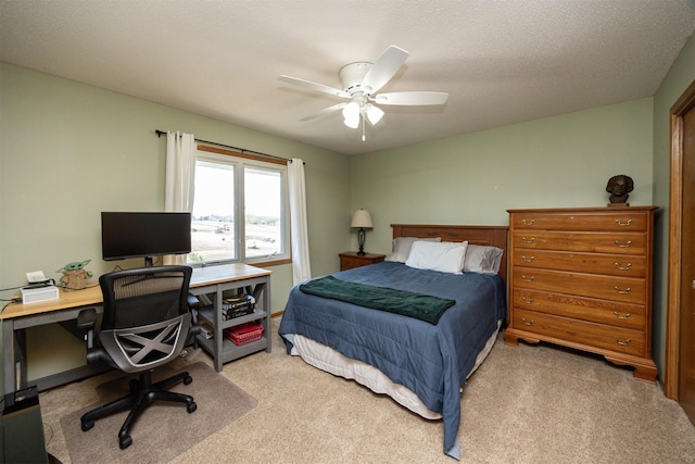 5030 Oakcreek Dr, Norwalk, IA 50211 - bedroom with carpet, a desk, and ceiling fan
