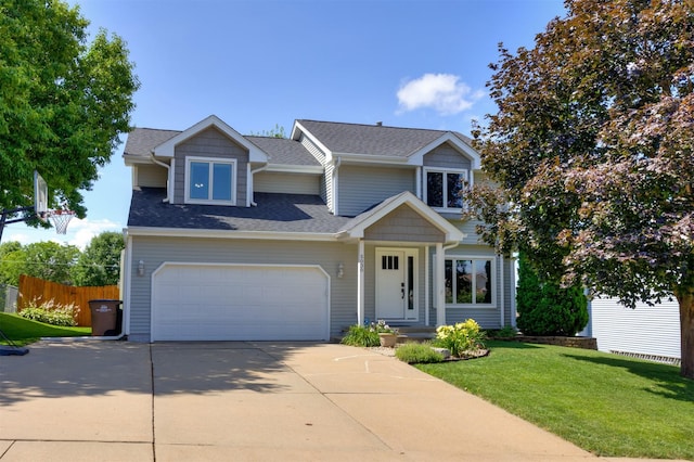 5030 Oakcreek Dr, Norwalk, IA 50211 - traditional-style house featuring driveway and roof with shingles