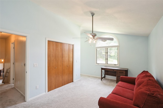 1711 Plaza Cir, Windsor Heights, IA 50324 - carpeted living room featuring lofted ceiling and ceiling fan