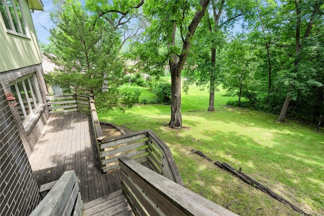 1711 Plaza Cir, Windsor Heights, IA 50324 - deck with a yard