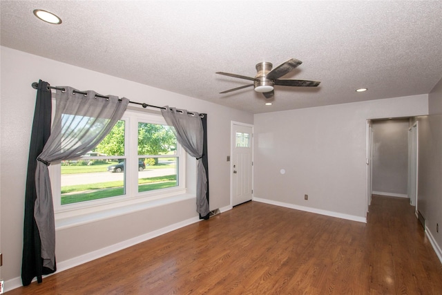 500 Scandia Ave, Des Moines, IA 50315 - empty room featuring a textured ceiling, wood finished floors, a ceiling fan, and recessed lighting