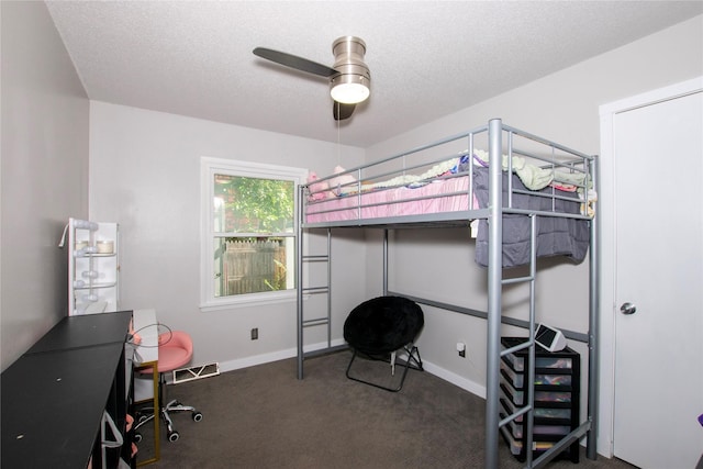 500 Scandia Ave, Des Moines, IA 50315 - carpeted bedroom with ceiling fan and a textured ceiling