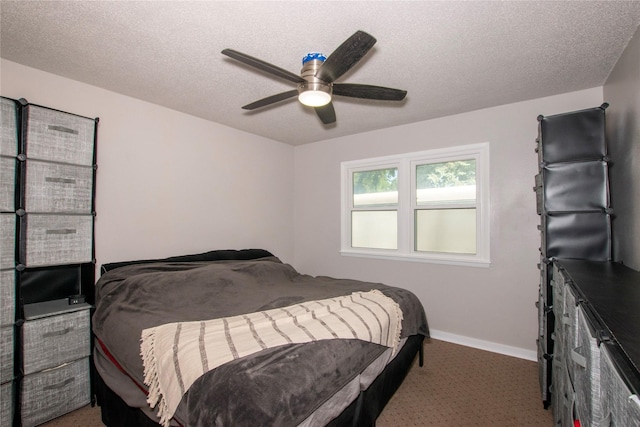 500 Scandia Ave, Des Moines, IA 50315 - carpeted bedroom featuring a textured ceiling and ceiling fan