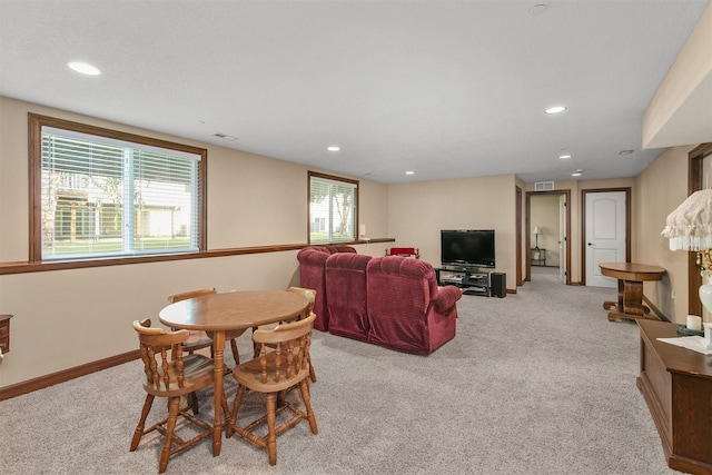 6054 Bradford Ln, Johnston, IA 50131 - dining area featuring carpet floors and recessed lighting