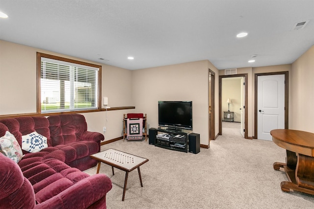6054 Bradford Ln, Johnston, IA 50131 - carpeted living room with recessed lighting