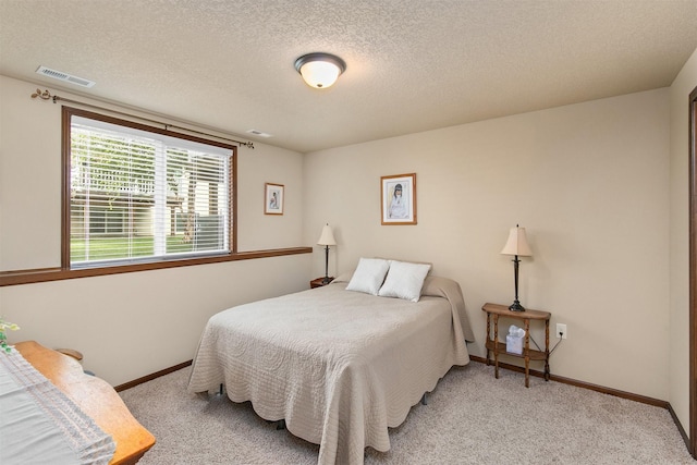 6054 Bradford Ln, Johnston, IA 50131 - bedroom featuring carpet floors and a textured ceiling