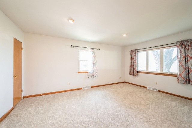 4326 E Washburn Rd, Waterloo, IA 50702 - unfurnished room with healthy amount of natural light and carpet floors