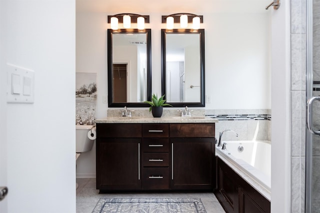 296 S 82nd St, West Des Moines, IA 50266 - full bathroom featuring double vanity, a bath, tile patterned flooring, and a shower with door