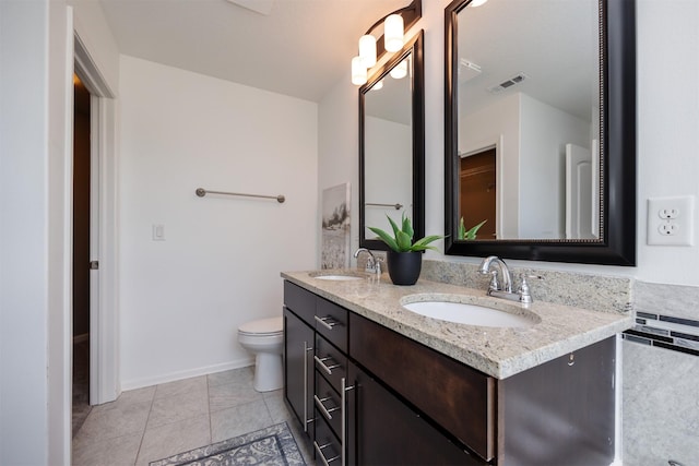 296 S 82nd St, West Des Moines, IA 50266 - bathroom with double vanity and tile patterned flooring
